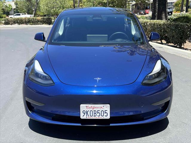 used 2023 Tesla Model 3 car, priced at $19,500