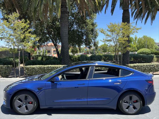 used 2023 Tesla Model 3 car, priced at $19,500