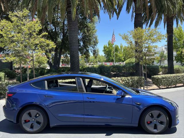 used 2023 Tesla Model 3 car, priced at $19,500