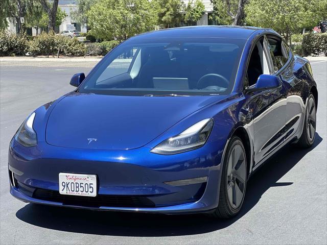 used 2023 Tesla Model 3 car, priced at $19,500
