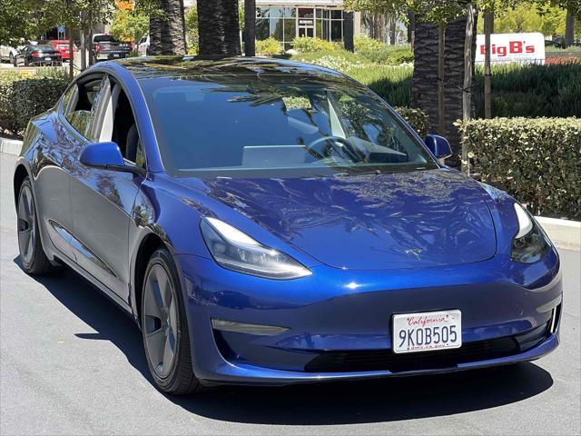 used 2023 Tesla Model 3 car, priced at $19,500