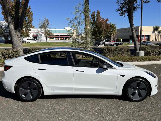 used 2022 Tesla Model 3 car, priced at $30,500