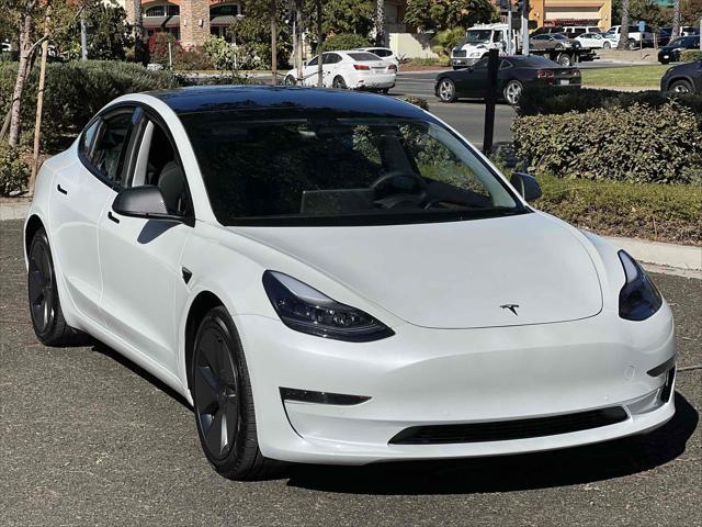 used 2022 Tesla Model 3 car, priced at $30,500