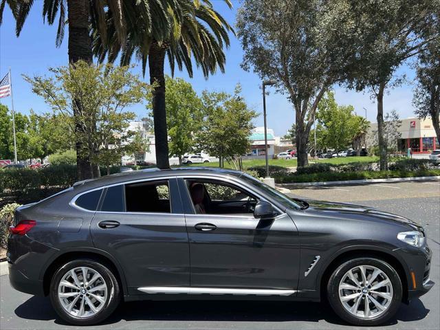 used 2019 BMW X4 car, priced at $19,990