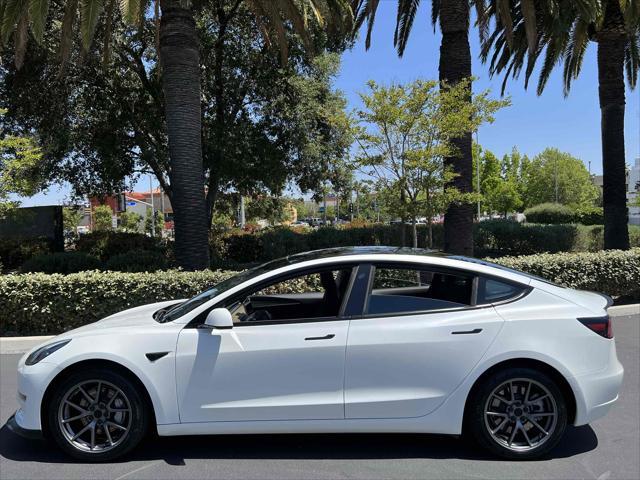 used 2022 Tesla Model 3 car, priced at $16,890