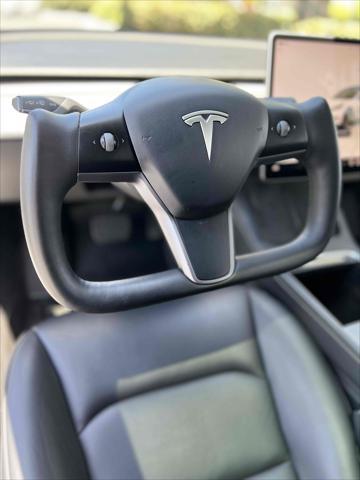 used 2022 Tesla Model 3 car, priced at $16,890