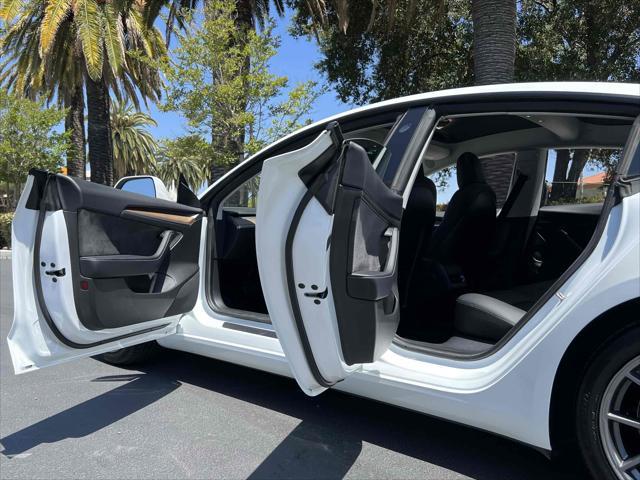 used 2022 Tesla Model 3 car, priced at $16,890