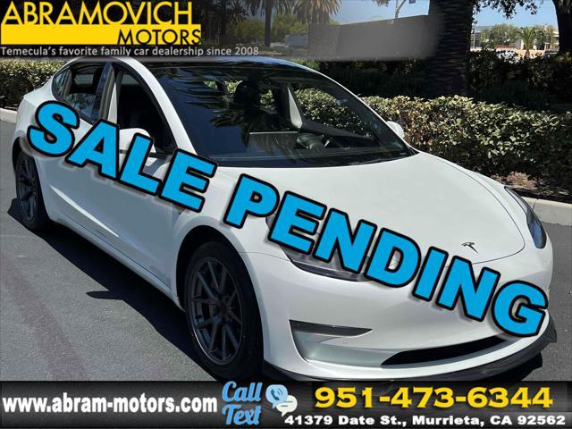 used 2022 Tesla Model 3 car, priced at $15,990