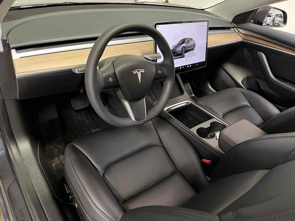 used 2023 Tesla Model 3 car, priced at $20,990
