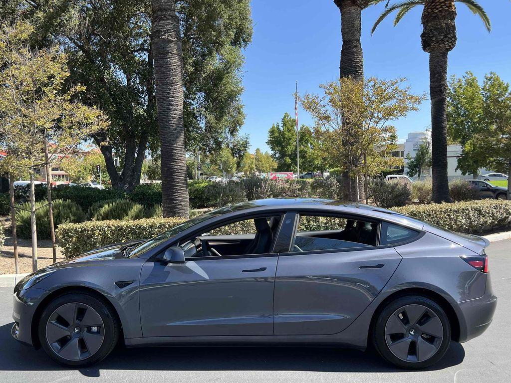 used 2023 Tesla Model 3 car, priced at $20,990