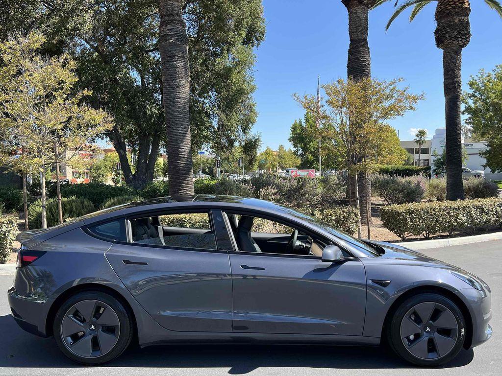used 2023 Tesla Model 3 car, priced at $20,990