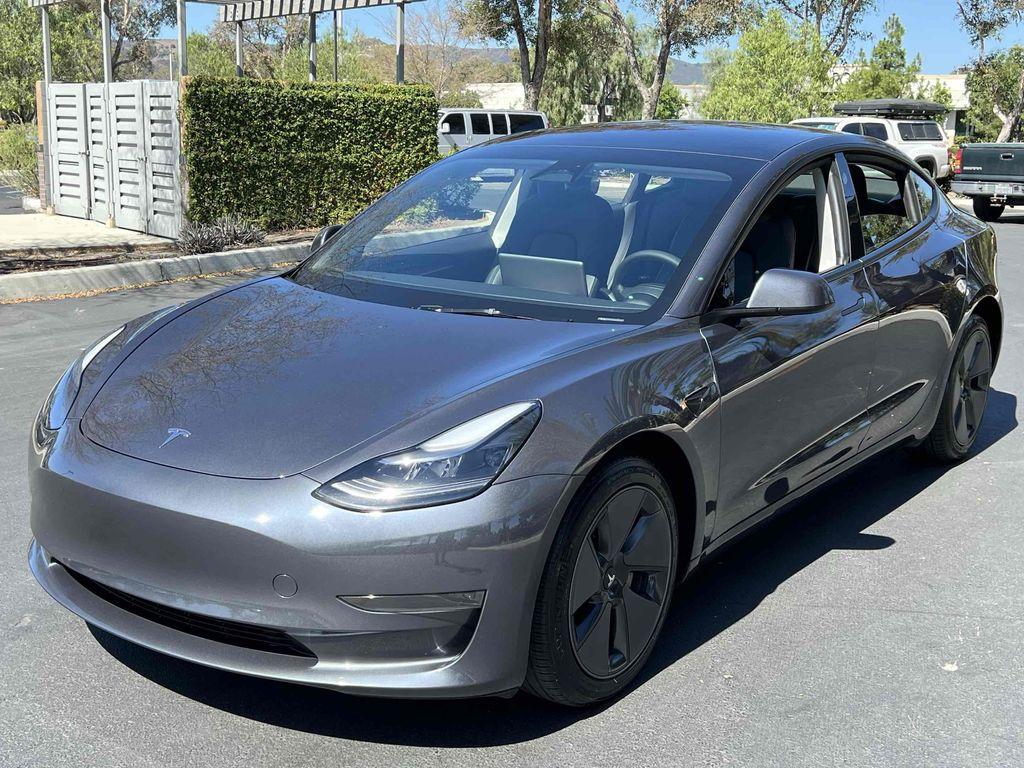 used 2023 Tesla Model 3 car, priced at $20,990