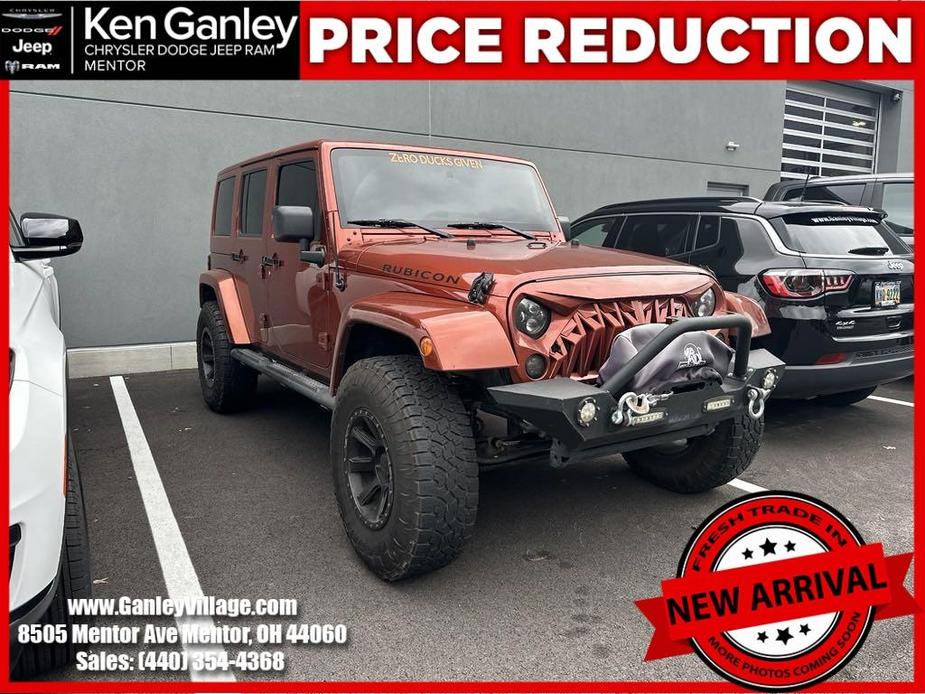 used 2014 Jeep Wrangler Unlimited car, priced at $22,150