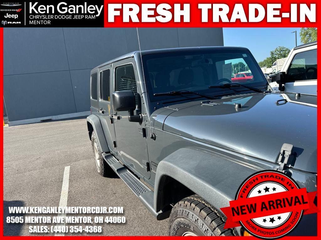 used 2016 Jeep Wrangler Unlimited car, priced at $9,500