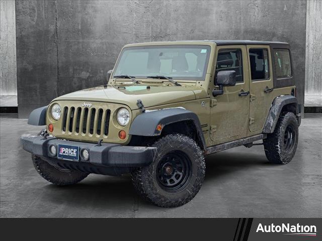 used 2013 Jeep Wrangler Unlimited car, priced at $15,799