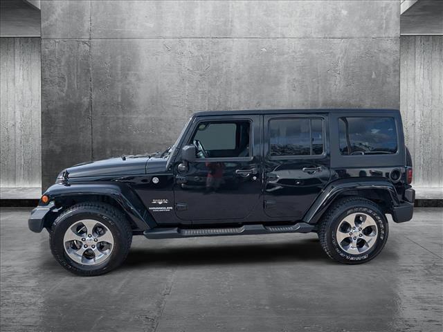 used 2016 Jeep Wrangler Unlimited car, priced at $23,077