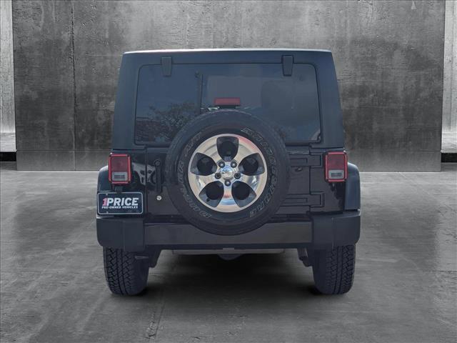 used 2016 Jeep Wrangler Unlimited car, priced at $23,077