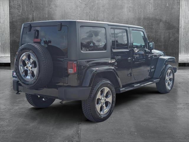 used 2016 Jeep Wrangler Unlimited car, priced at $23,077