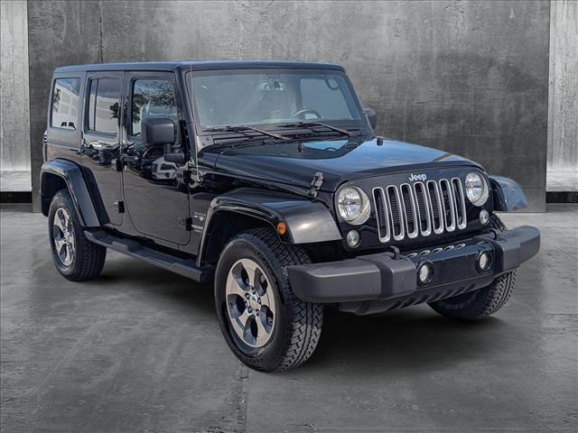 used 2016 Jeep Wrangler Unlimited car, priced at $23,077