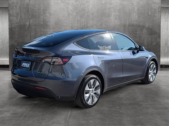 used 2023 Tesla Model Y car, priced at $33,452