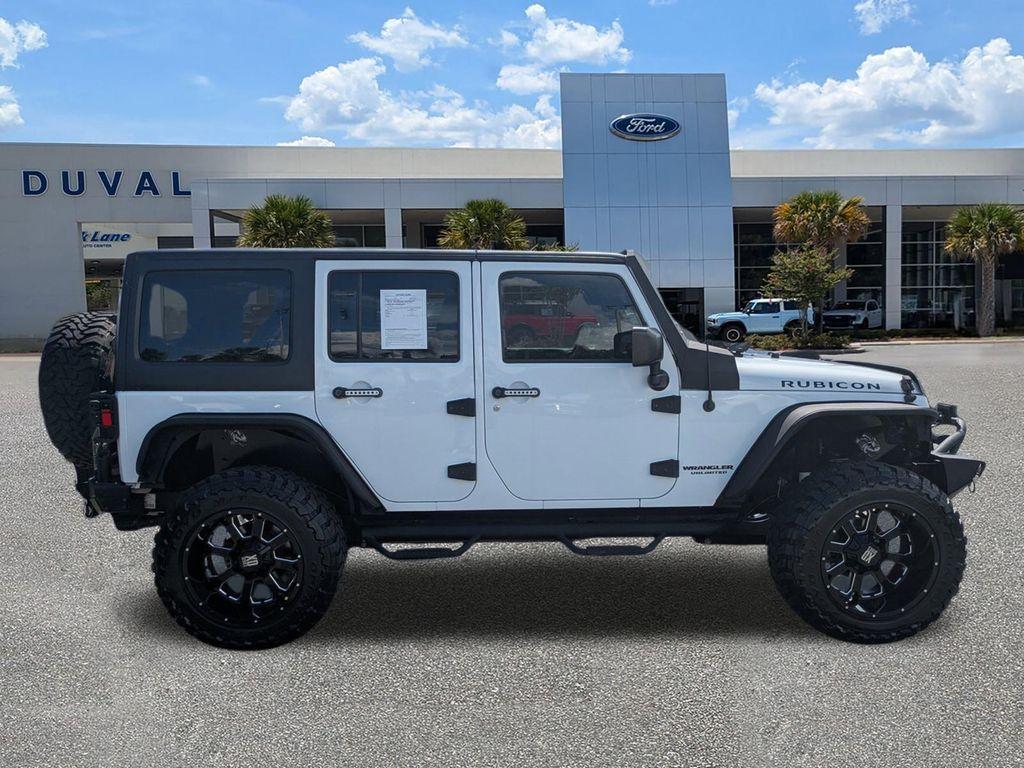 used 2016 Jeep Wrangler Unlimited car, priced at $23,976
