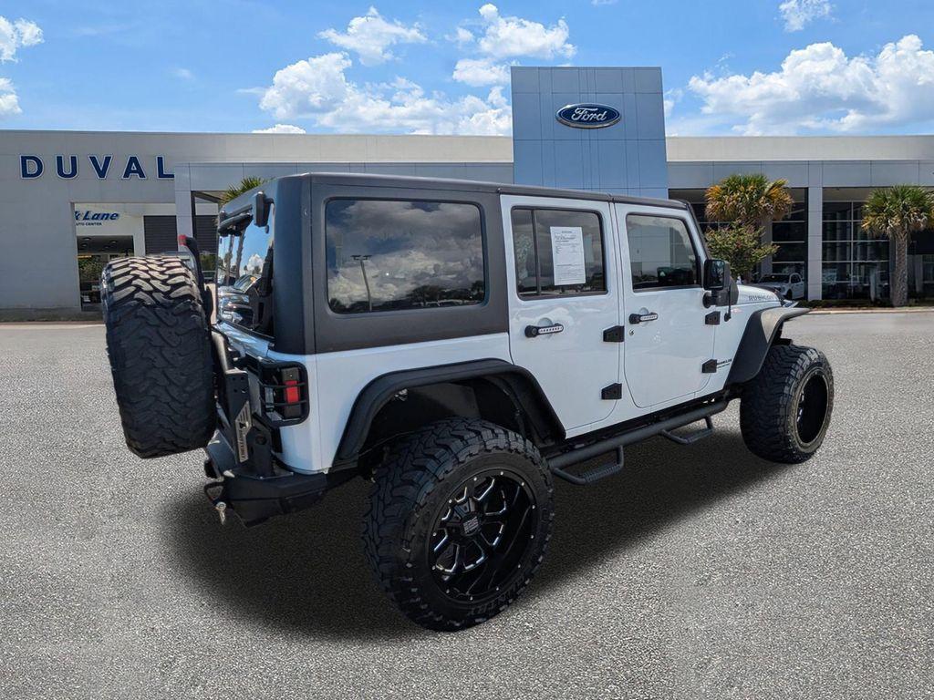 used 2016 Jeep Wrangler Unlimited car, priced at $23,976