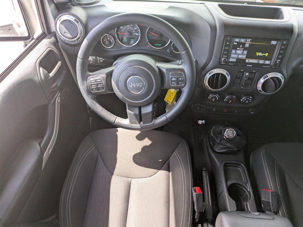 used 2016 Jeep Wrangler Unlimited car, priced at $23,976