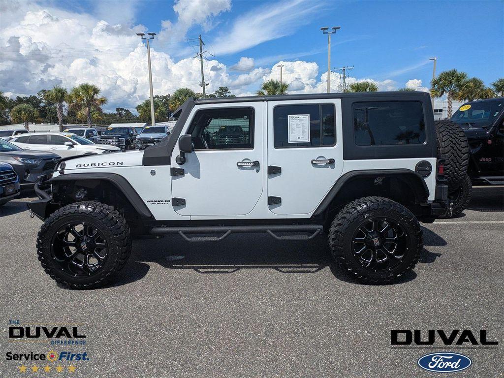 used 2016 Jeep Wrangler Unlimited car, priced at $23,976