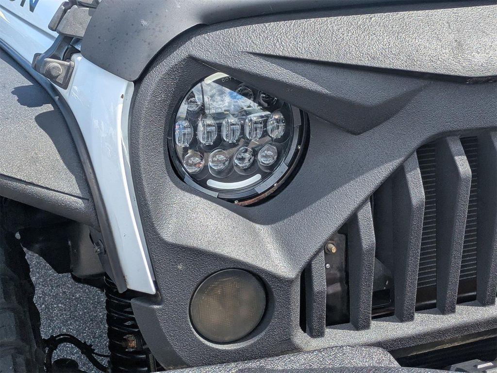 used 2016 Jeep Wrangler Unlimited car, priced at $23,976