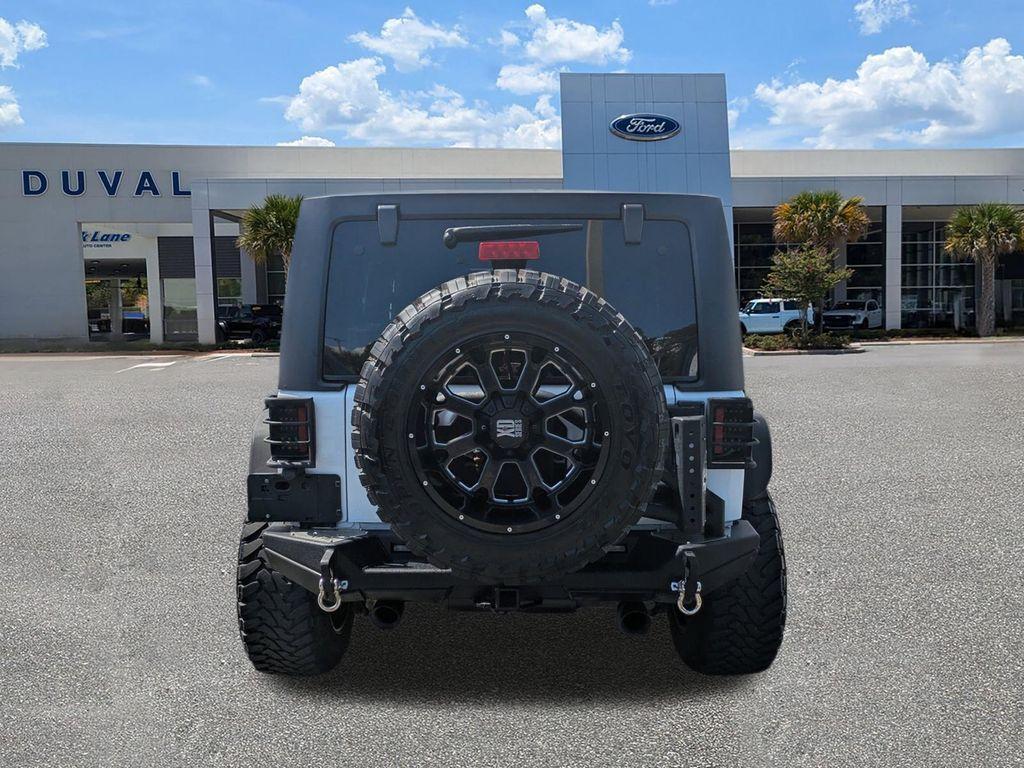 used 2016 Jeep Wrangler Unlimited car, priced at $23,976
