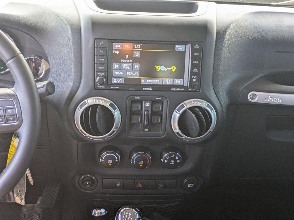 used 2016 Jeep Wrangler Unlimited car, priced at $23,976