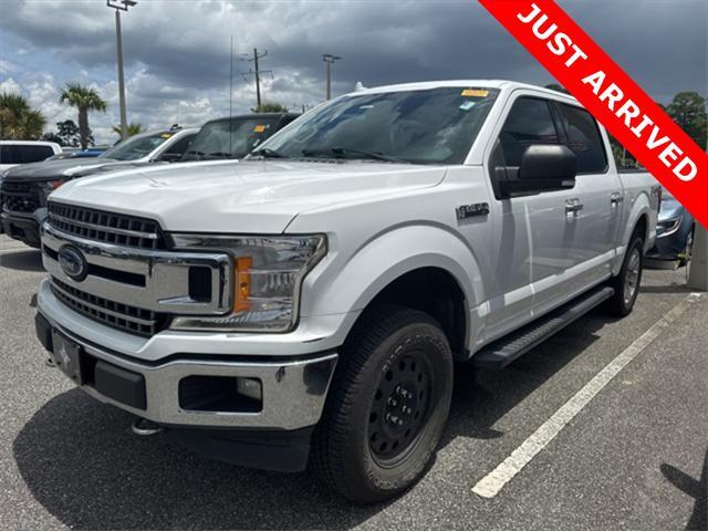 used 2018 Ford F-150 car, priced at $18,000
