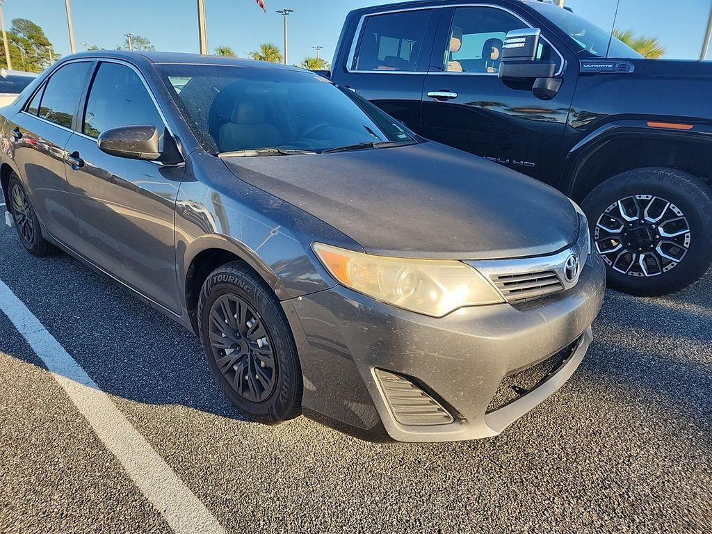 used 2013 Toyota Camry car, priced at $6,000