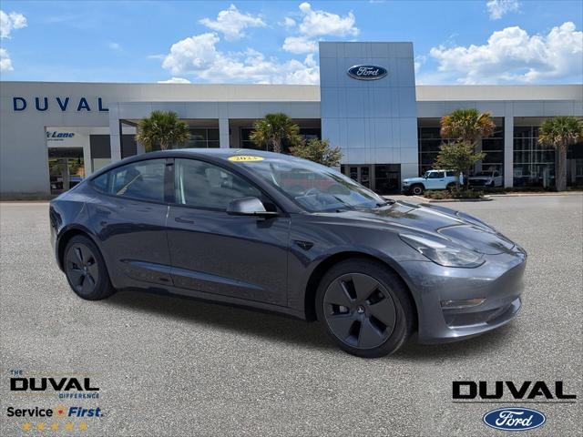 used 2023 Tesla Model 3 car, priced at $22,000