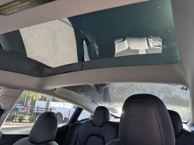 used 2023 Tesla Model 3 car, priced at $23,977