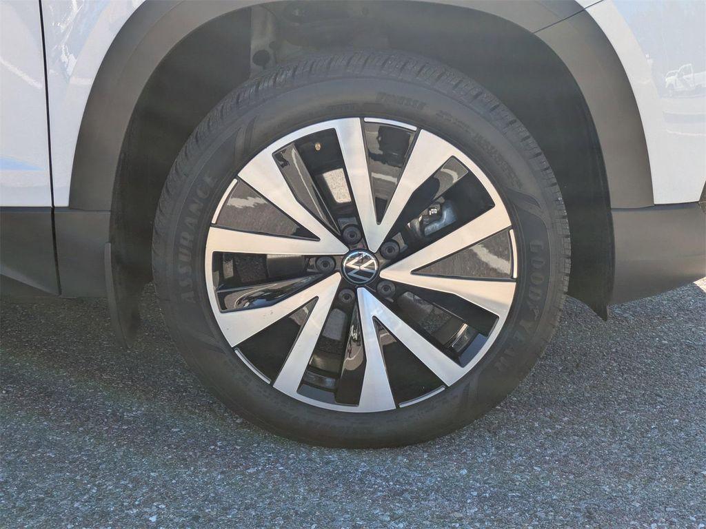 used 2023 Volkswagen Taos car, priced at $21,000