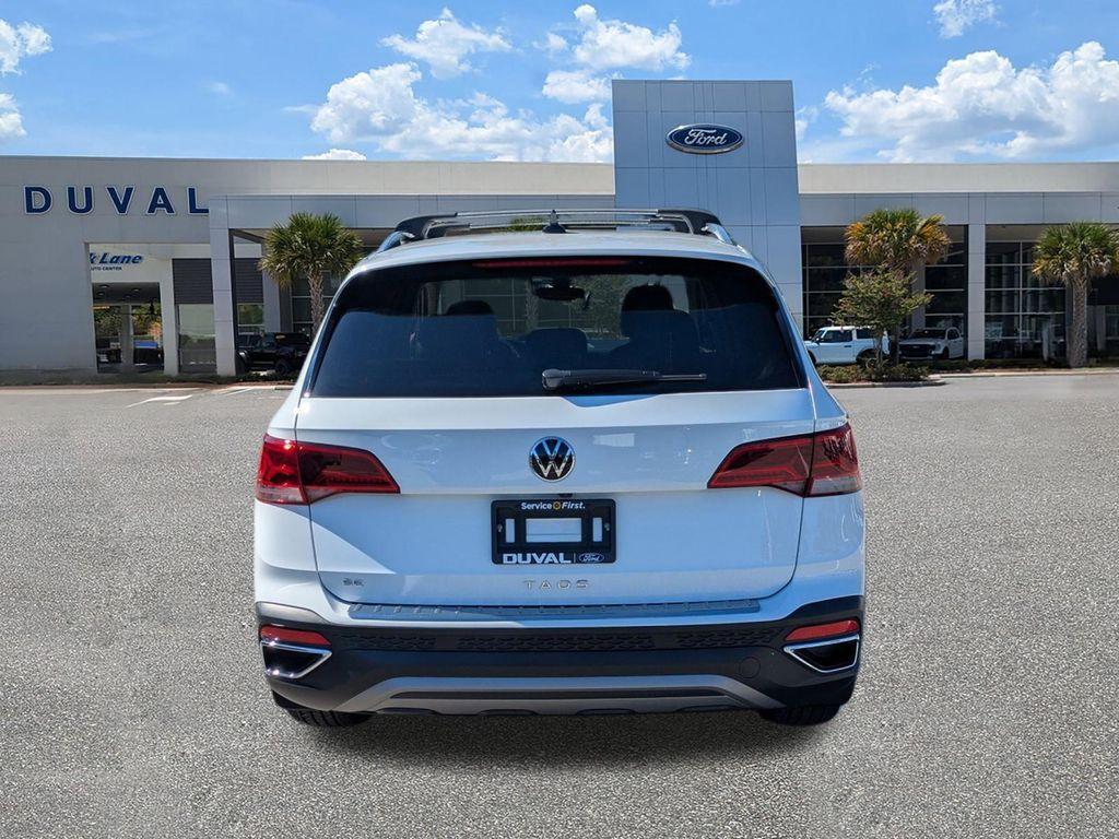 used 2023 Volkswagen Taos car, priced at $21,000
