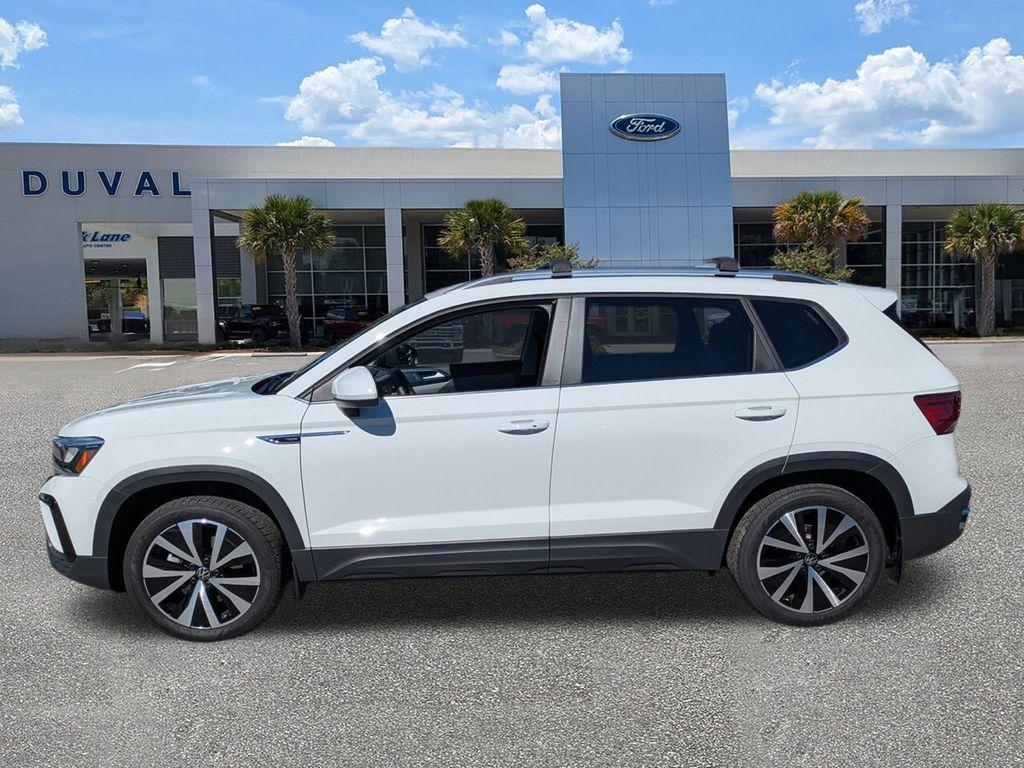 used 2023 Volkswagen Taos car, priced at $21,000