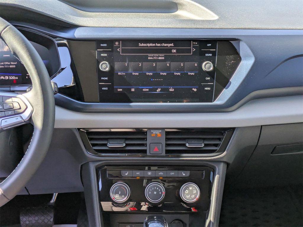 used 2023 Volkswagen Taos car, priced at $21,000