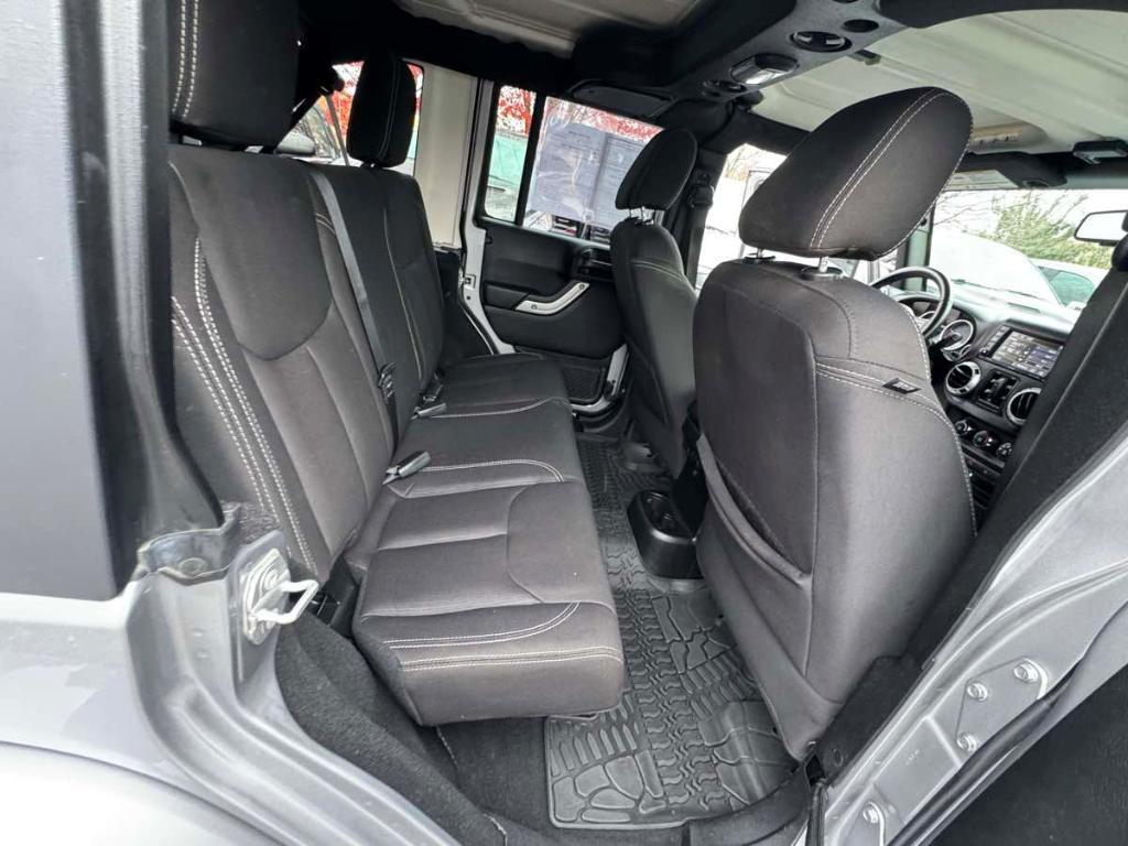 used 2018 Jeep Wrangler JK Unlimited car, priced at $23,900