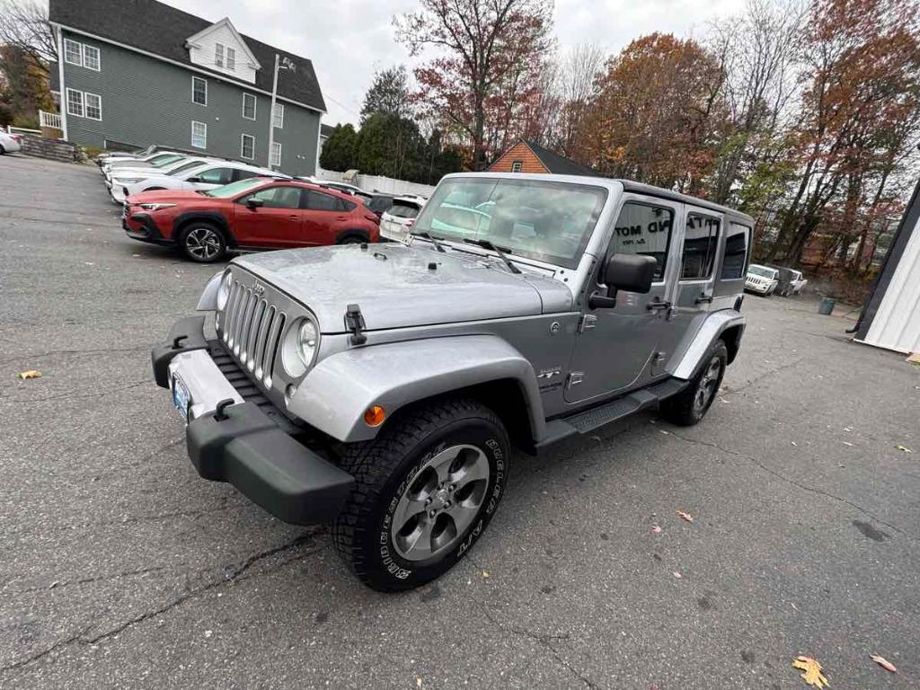used 2018 Jeep Wrangler JK Unlimited car, priced at $23,900