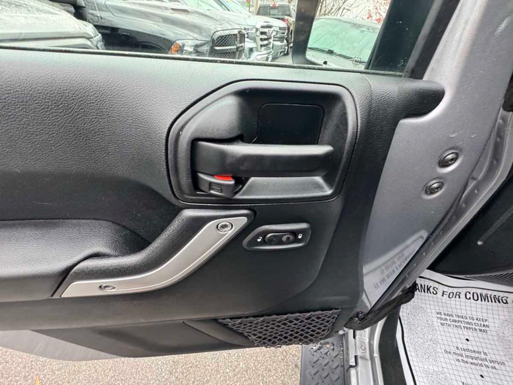 used 2018 Jeep Wrangler JK Unlimited car, priced at $23,900