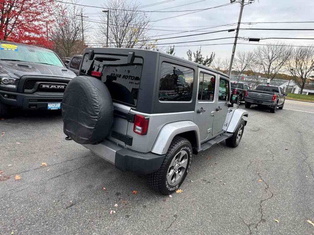 used 2018 Jeep Wrangler JK Unlimited car, priced at $23,900