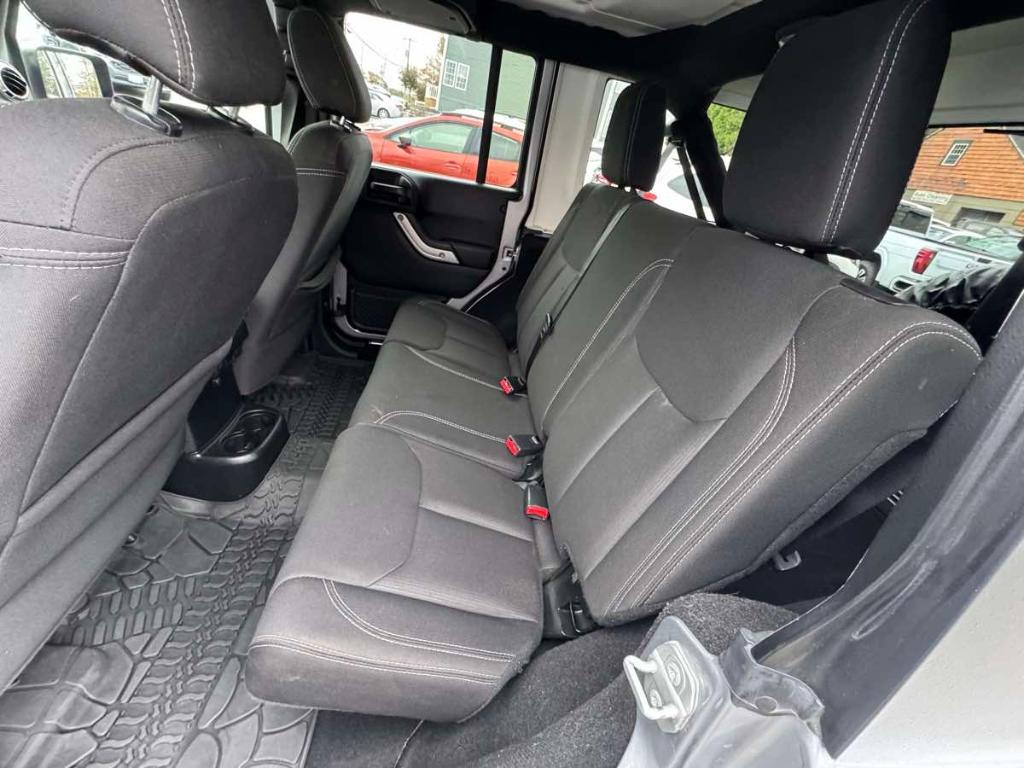 used 2018 Jeep Wrangler JK Unlimited car, priced at $23,900