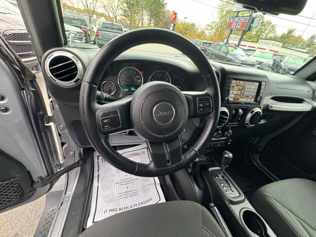 used 2018 Jeep Wrangler JK Unlimited car, priced at $23,900