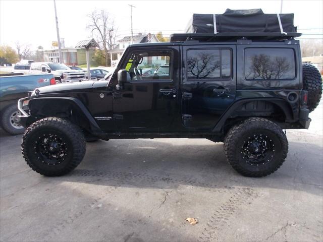 used 2013 Jeep Wrangler Unlimited car, priced at $23,900