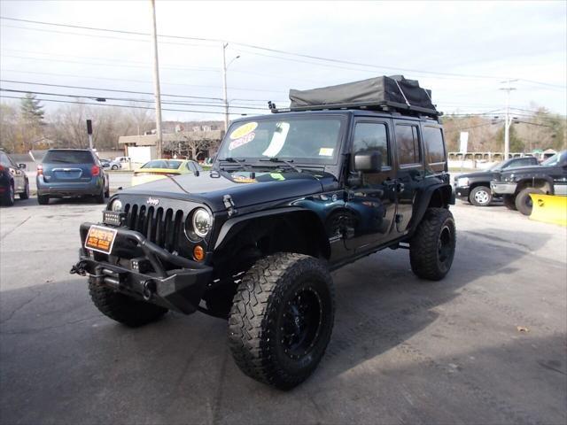 used 2013 Jeep Wrangler Unlimited car, priced at $23,900