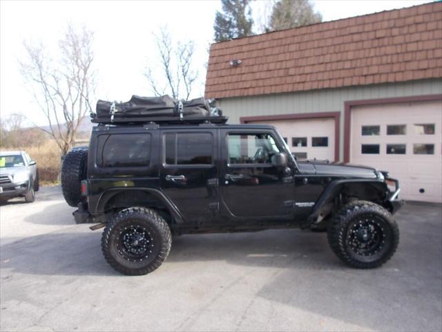 used 2013 Jeep Wrangler Unlimited car, priced at $23,900