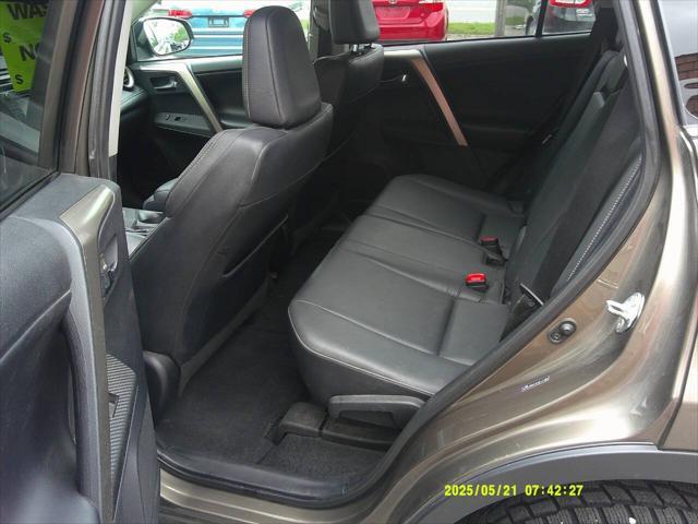 used 2013 Toyota RAV4 car, priced at $10,900