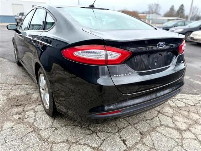 used 2014 Ford Fusion car, priced at $7,495